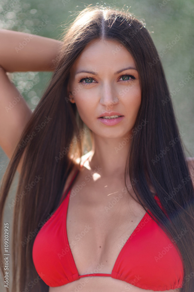 portrait of a beautiful sexy woman on the beach