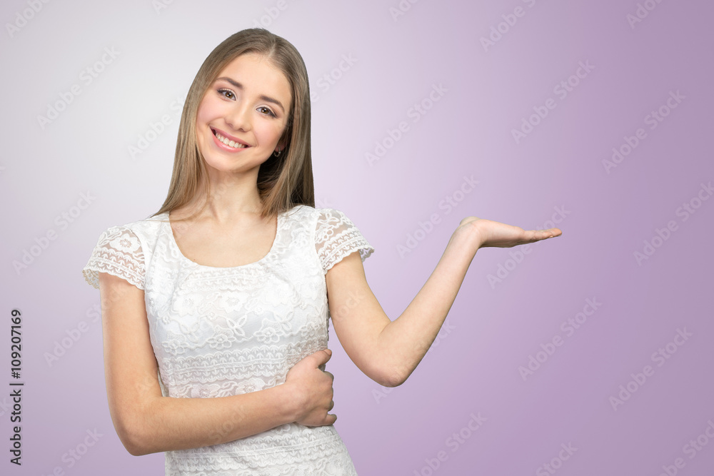 Beautiful happy smiling woman showing copy space Beautiful happy smiling woman showing copy space
