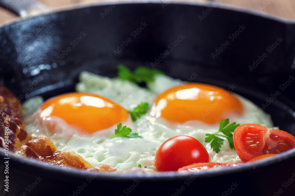 Bacon and Eggs with tomatoes for breakfast Bacon and Eggs with tomatoes for breakfast
