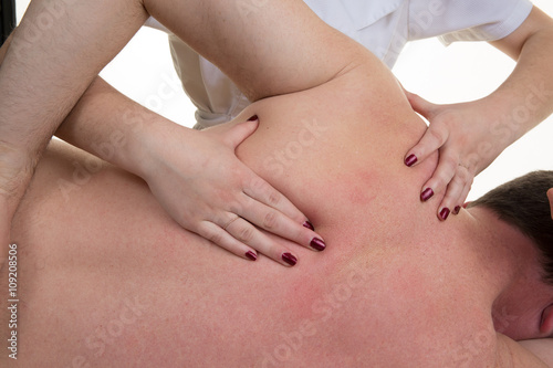 Close-up of a man s back having a massage in a spa center
