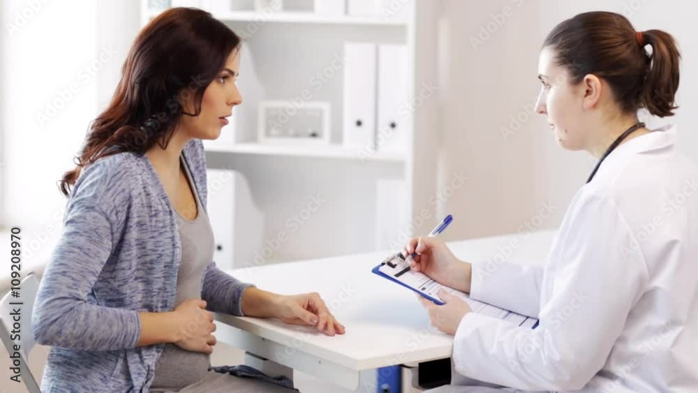 gynecologist and pregnant woman at hospital gynecologist and pregnant woman at hospital