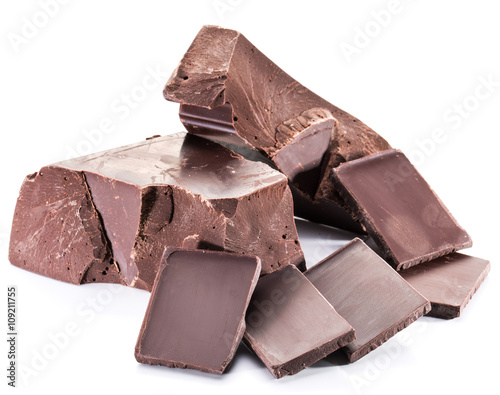 Chocolate blocks and pieces of chocolate bar isolated on a white