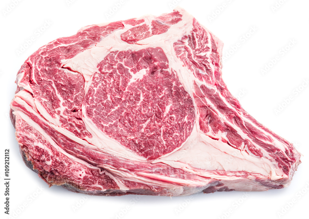 Obraz premium Rib eye steak isolated over white.