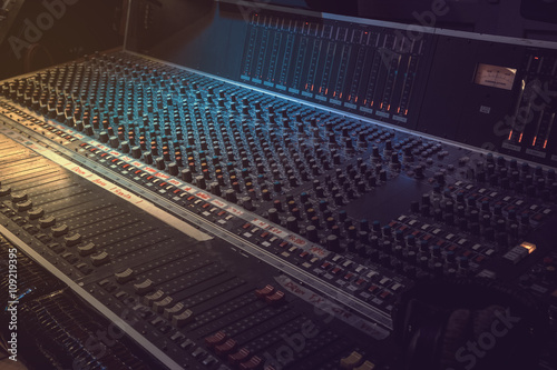 Sound recording equipment. Music mixer controls. Soft photo