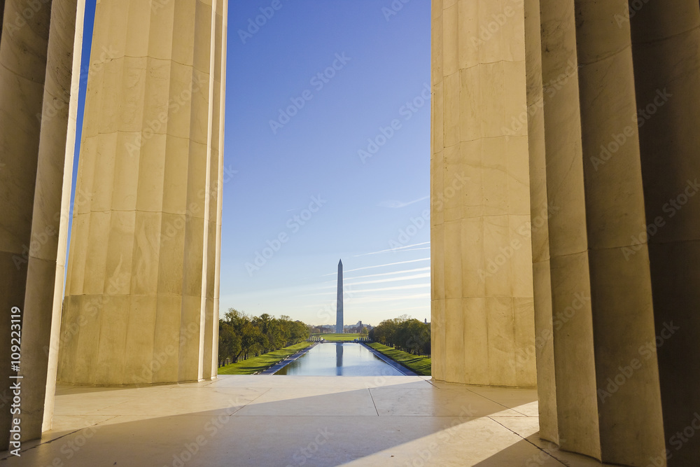 View of Washington DC's National Mall a grand urban tree-lined boulevard providing a stunning ceremonial pathway in to the heart of the city, taken from the interior of the Lincoln Memorial