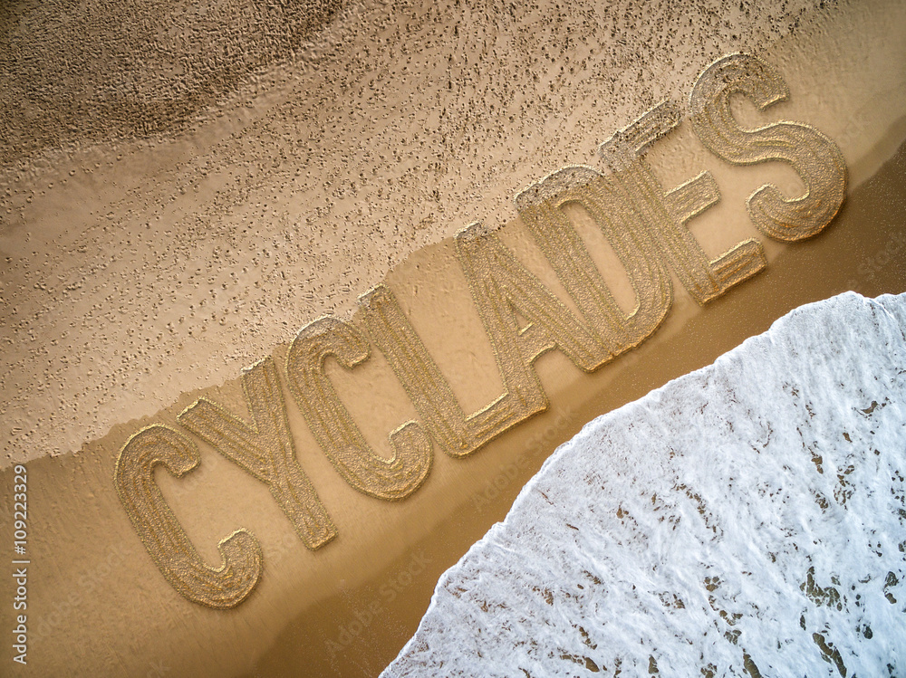 Cyclades written on the beach - obrazy, fototapety, plakaty 