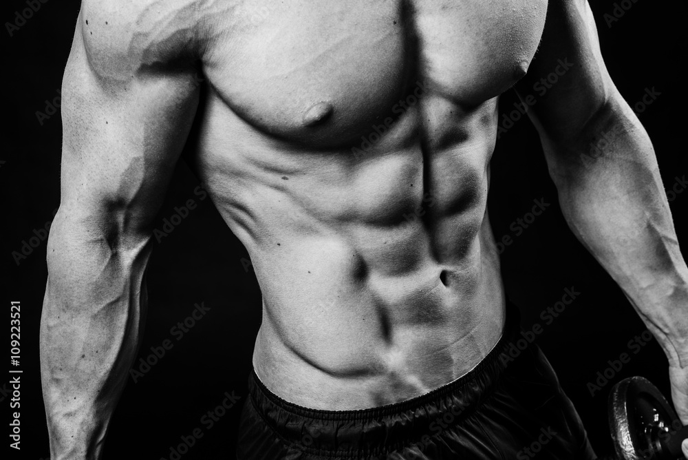 Closeup of cool perfect sexy strong sensual bare torso with abs pectorals 6 pack muscles chest black and white studio, horizontal picture Closeup of cool perfect sexy strong sensual bare torso with abs pectorals 6 pack muscles chest black and white studio, horizontal picture