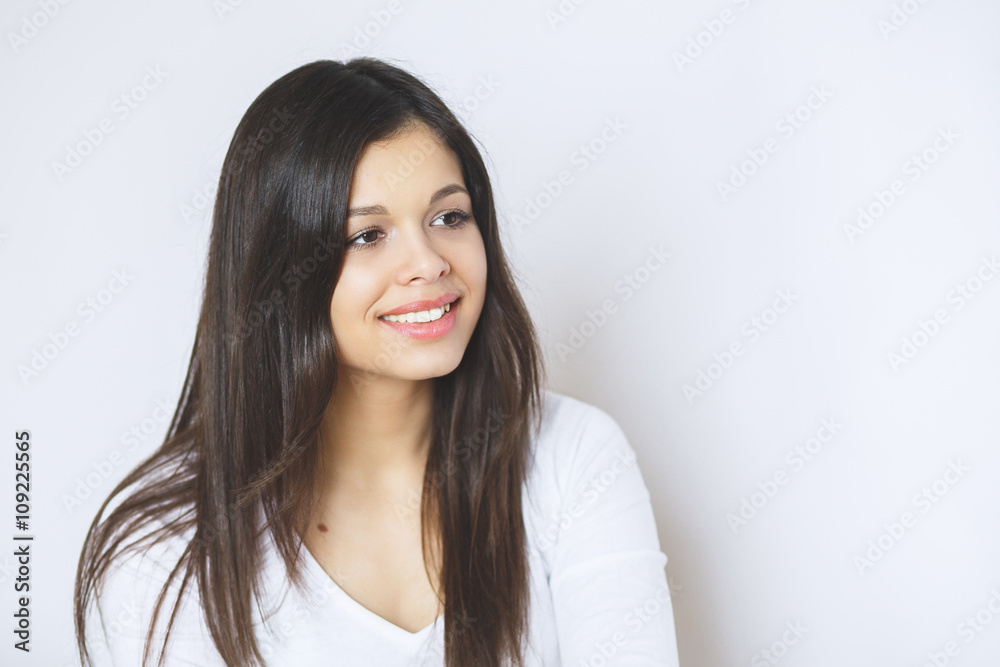 Beautiful woman smiling. Young Female touching Her Skin. Portrait on White Background. Perfect Skin. Beauty Face. Beautiful woman smiling. Young Female touching Her Skin. Portrait on White Background. Perfect Skin. Beauty Face.
