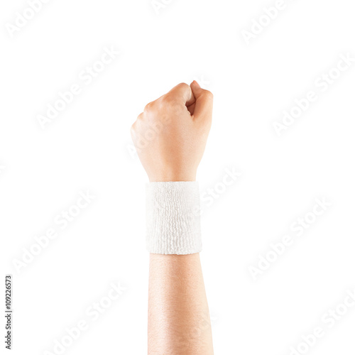 Blank white wristband mockup on hand, isolated. Clear sweat band mock up design. Sport sweatband template wear on wrist arm. Sports support protective bandage wrap. Bangle on the tennis player hand.