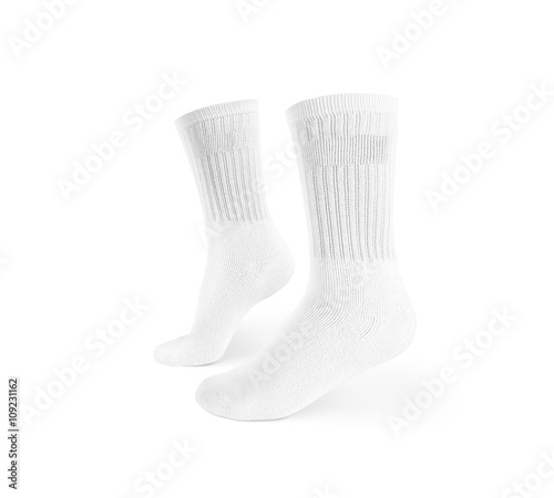 Blank white socks design mockup, isolated, clipping path. Pair sport crew cotton socks wear mock up. Long clear soft sock stand presentation. Men basketball, football, tennis plain socks template. photo