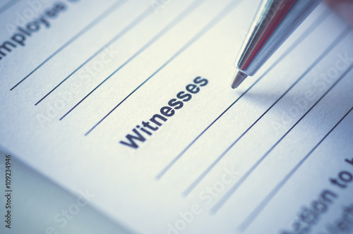 Hand writing on incedent witnesses paper.