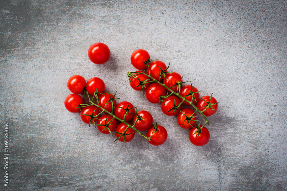 Tomatoes on concrete background Tomatoes on concrete background