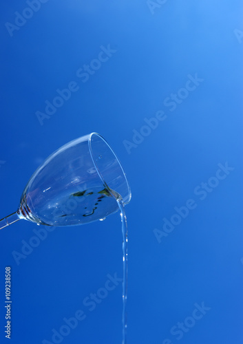 glass of water on the sky background