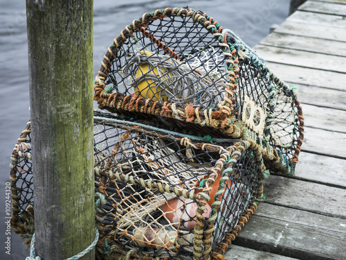 Lobster traps on jetty photo