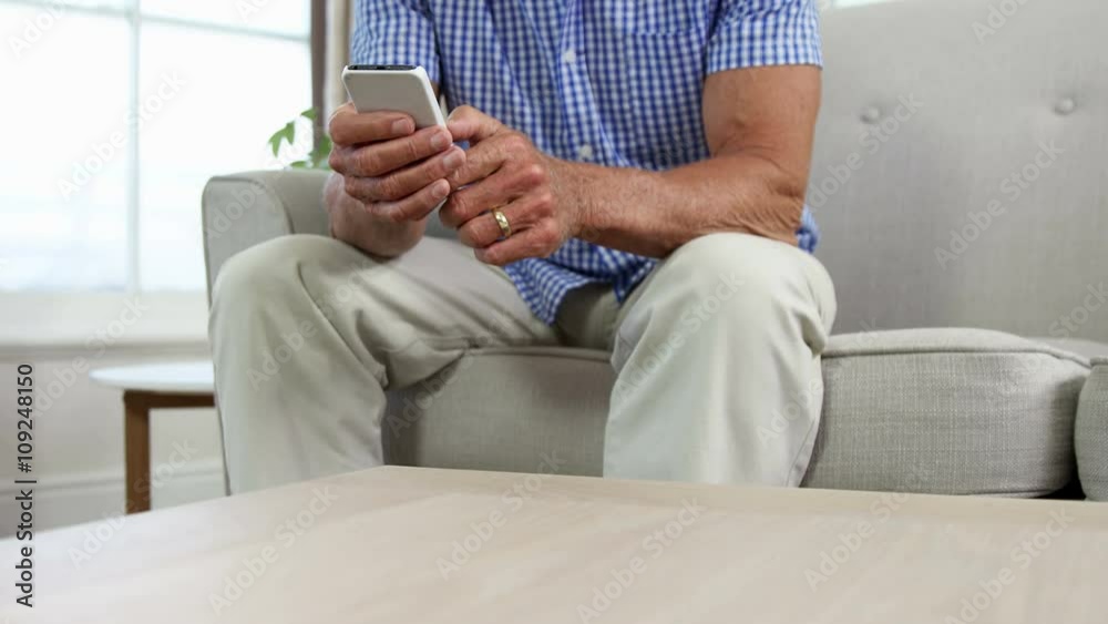 Senior man using smartphone Senior man using smartphone
