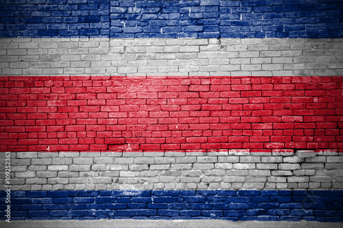 Ziegelsteinmauer mit Flagge Costa Rica