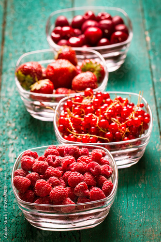 Fresh summer berries , wooden background, healthy food.