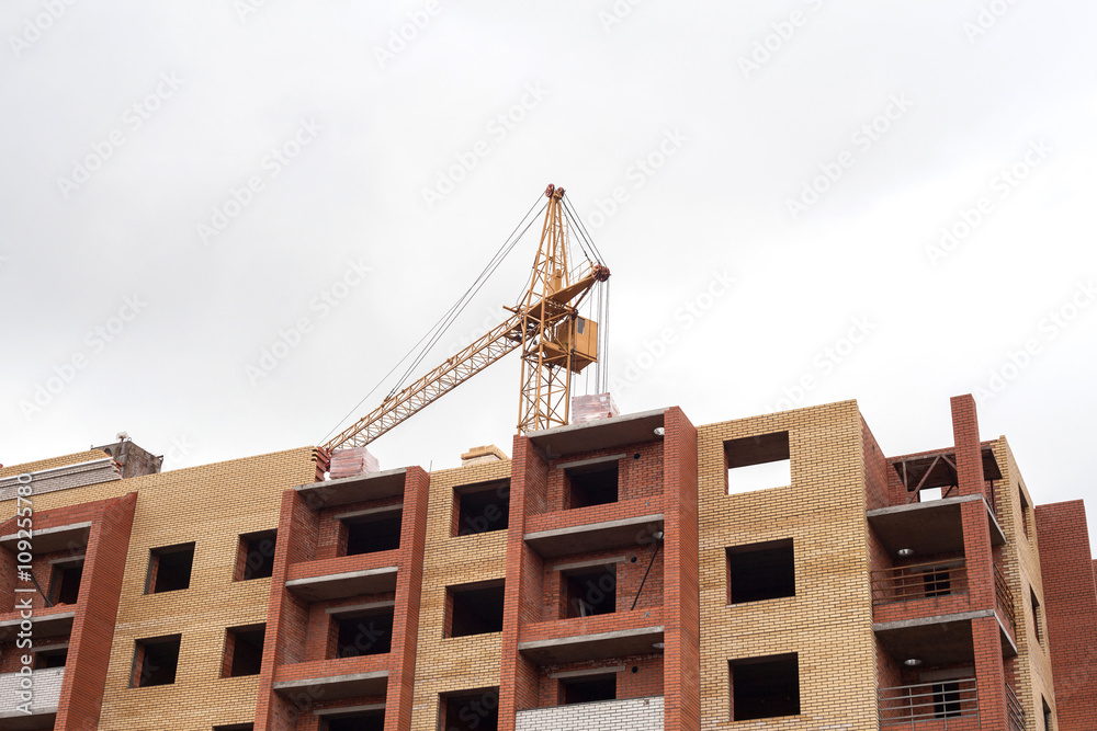 Construction of a brick apartment building
Construction of a brick apartment building