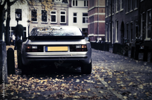 Fotografie, Obraz Vintage car on the street in autumn