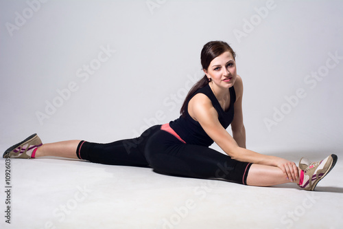 Beautiful woman doing split