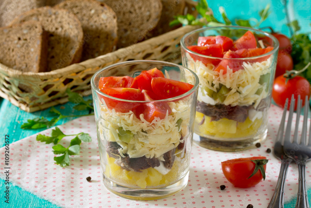 Salad with meat, cheese and vegetables (potatoes, pickled cucumb Salad with meat, cheese and vegetables (potatoes, pickled cucumb
