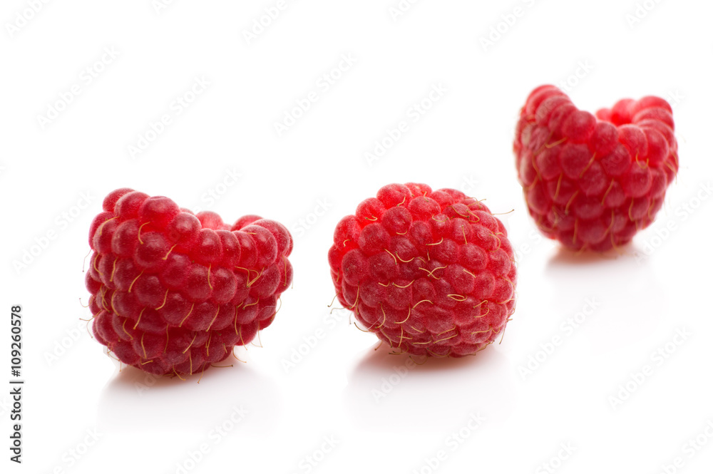 Fresh red raspberries isolated on white Fresh red raspberries isolated on white