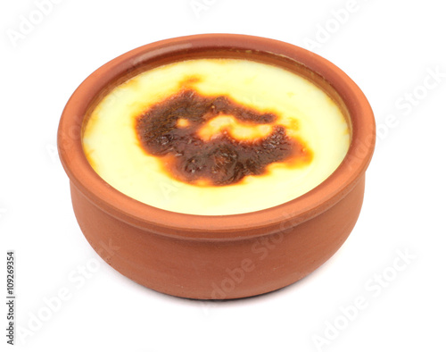Obraz na plátne Traditional Turkish cuisine, oven rice pudding in a earthenware bowl