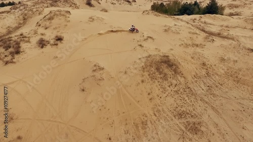 Motor racers in Oleshky sands. Ukraine. Slow motion photo