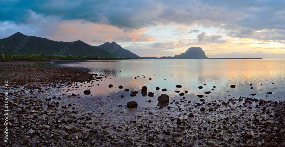Panorama picturesque sunset at a tropical beach. Mauritius Island