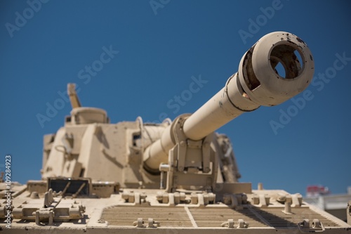 Heavy military tank turret and blue sky