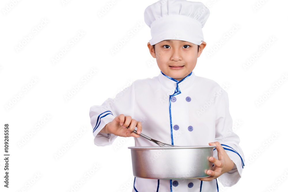 Asian Chinese Boy in white chef uniform Baking Cookies Asian Chinese Boy in white chef uniform Baking Cookies