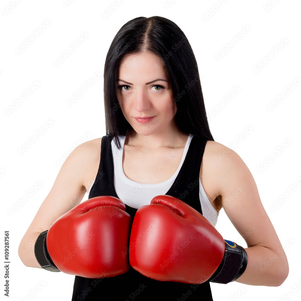 Portrait of a beautiful young brunette woman with red boxing glo Portrait of a beautiful young brunette woman with red boxing glo