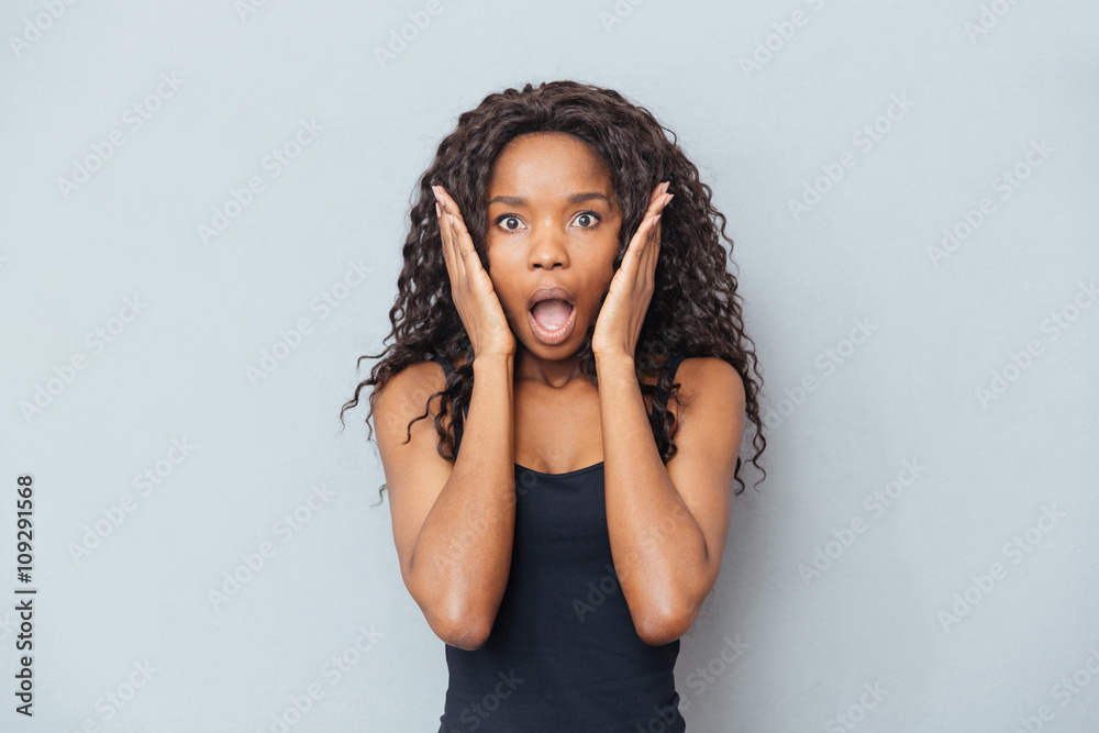 Amazed afro american woman looking at camera Amazed afro american woman looking at camera