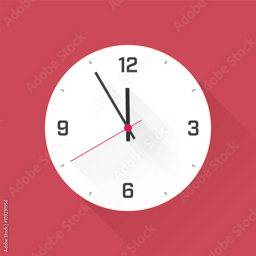 simple clock on the red wall