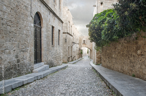 Fototapeta Naklejka Na Ścianę i Meble -  Rhodes old town is  oldest inhabited medieval town in Europe.  Street of the Knights is one of the best preserved and most delightful medieval relics in the world.  Rhodes  Island, Greece.