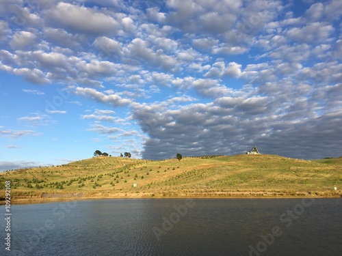 Cloudy sunny sky over national arboretum in Canberra photo
