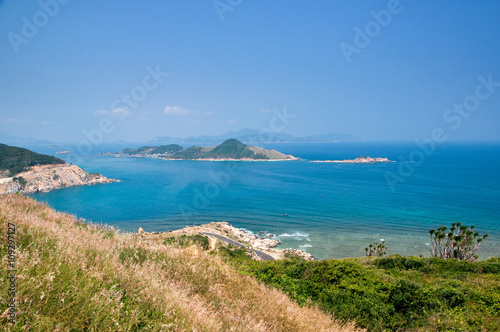 Sea coast near Nha Trang beach, Vietnam. Nha Trang is a popular tourist destination of Asia.