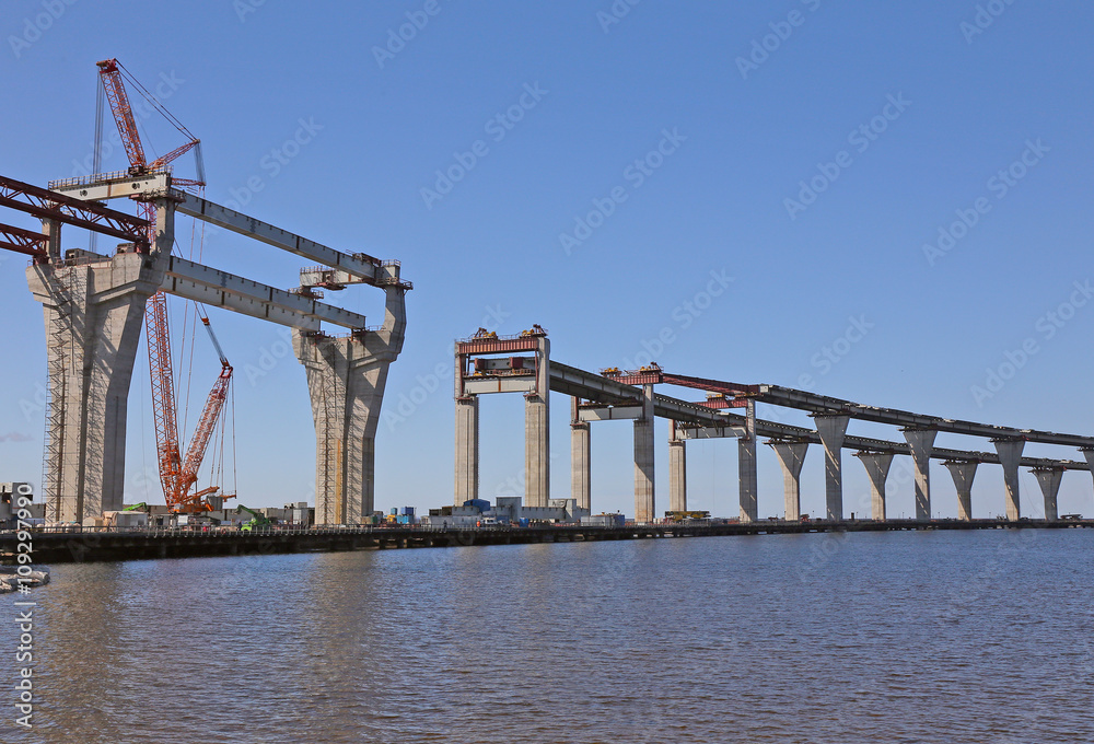construction of the viaduct with the highway on the water surface