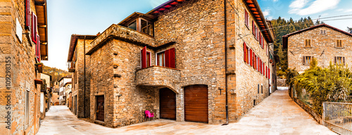 Alleys of mountain village in Tuscany photo