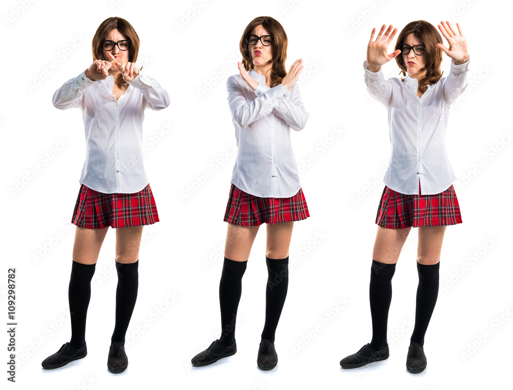 Fototapeta premium Pretty young girl doing NO gesture
