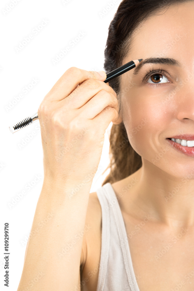 Fototapeta premium Applying eyebrow pencil