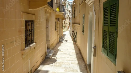 typical street with stairs in the city Valetta on the island of Malta photo