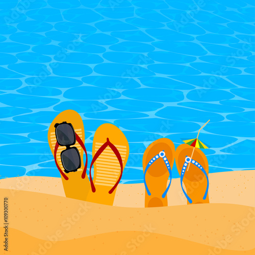 Two pairs slap on the seashore. Beach shoes on the sand with sun