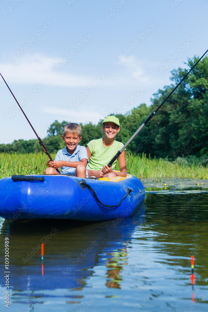 Kids fishing at the river Kids fishing at the river
