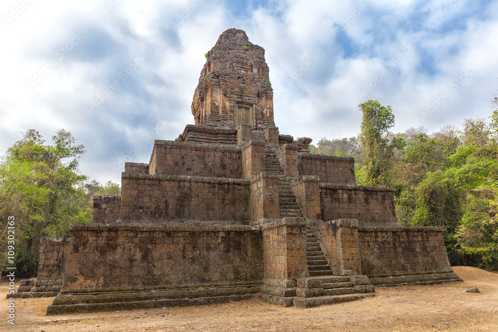 Baksei Chamkrong pyramid temple, Siem Reap. Cambodia. Blue sky with clouds background
