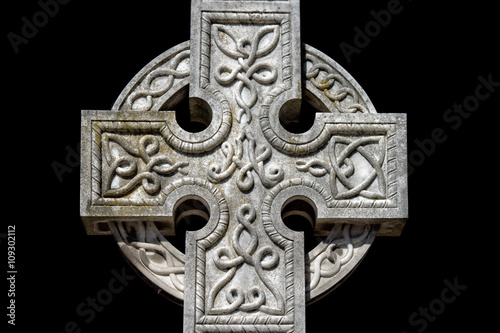 celtic cross cemetery on black photo