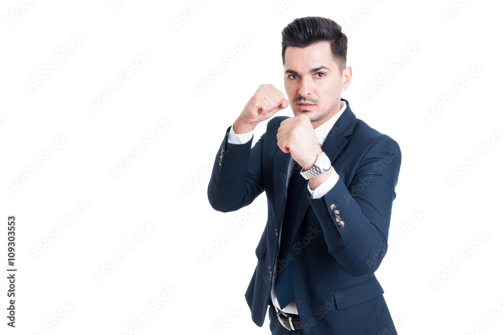Powerful businessman or salesman with fists ready Powerful businessman or salesman with fists ready