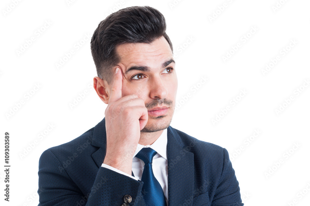 Portrait of a handsome young businessman thinking Portrait of a handsome young businessman thinking