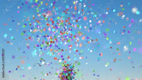 Confetti thrown into the sky with depth of field causing blurring - alpha / luminance key included