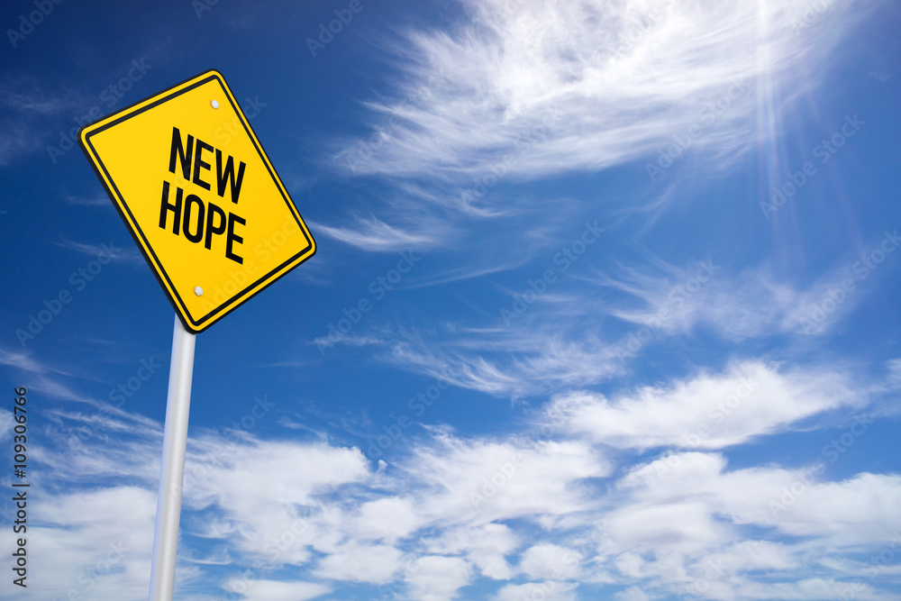 Naklejka premium New Hope Yellow Road Sign with Blue Sky Background